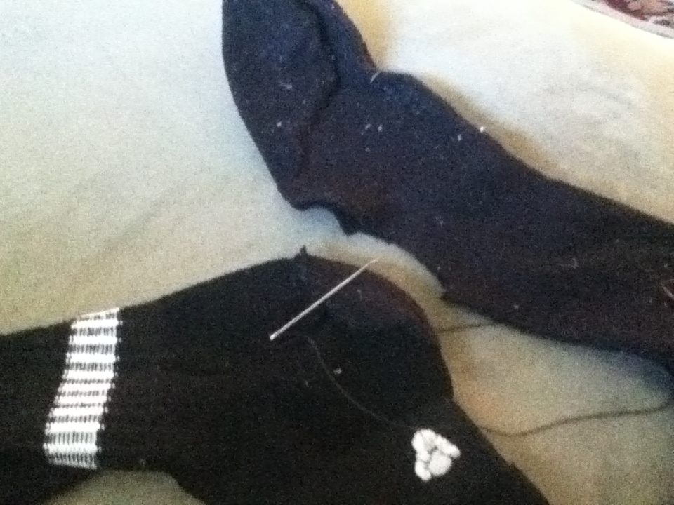 sacrificial sock and sock to be darned
